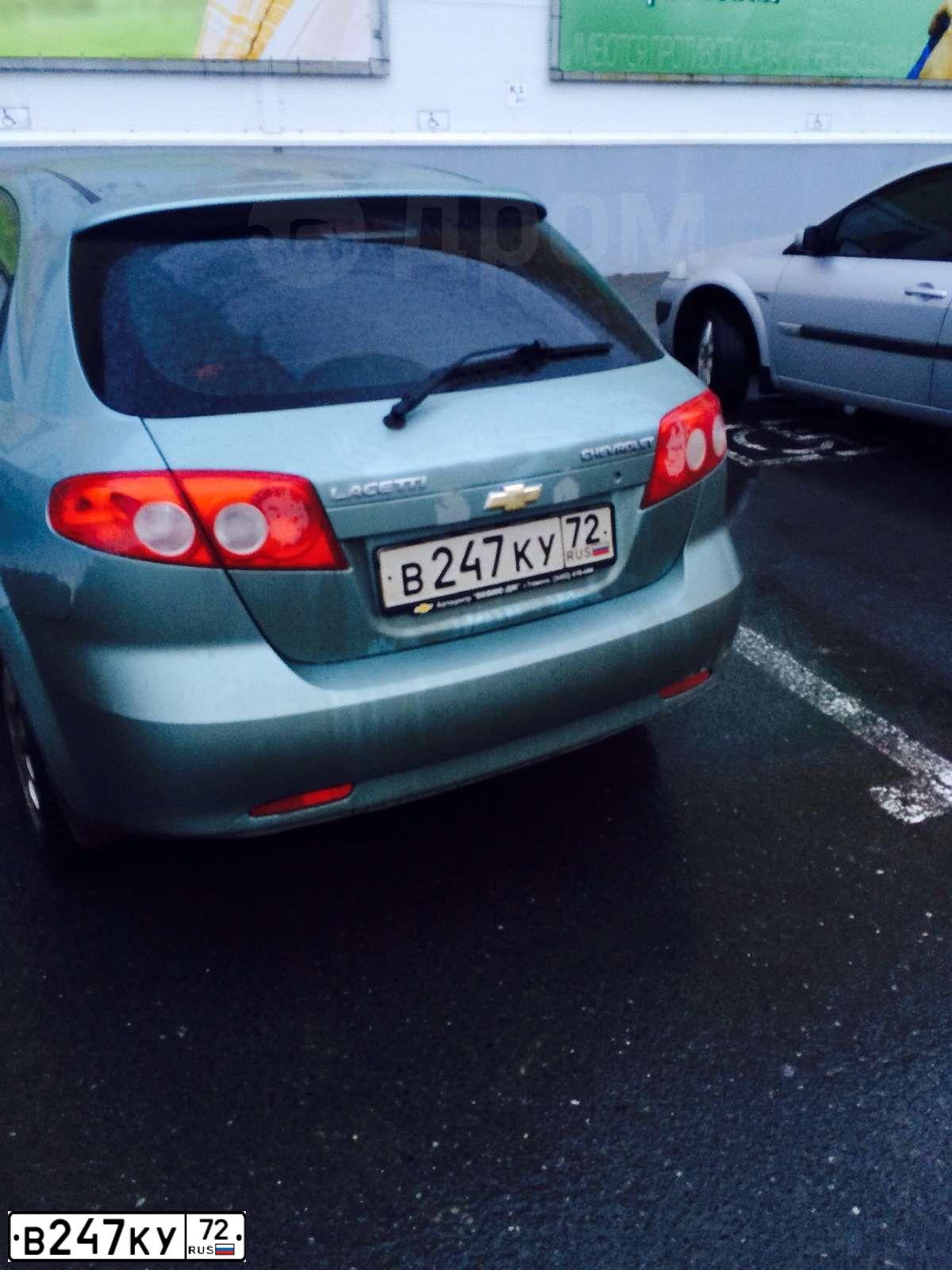 Фото автомобиля CHEVROLET LACETTI, 2007 — госномер В247КУ72. Цвет: СЕРО-ЗЕЛЕНЫЙ
