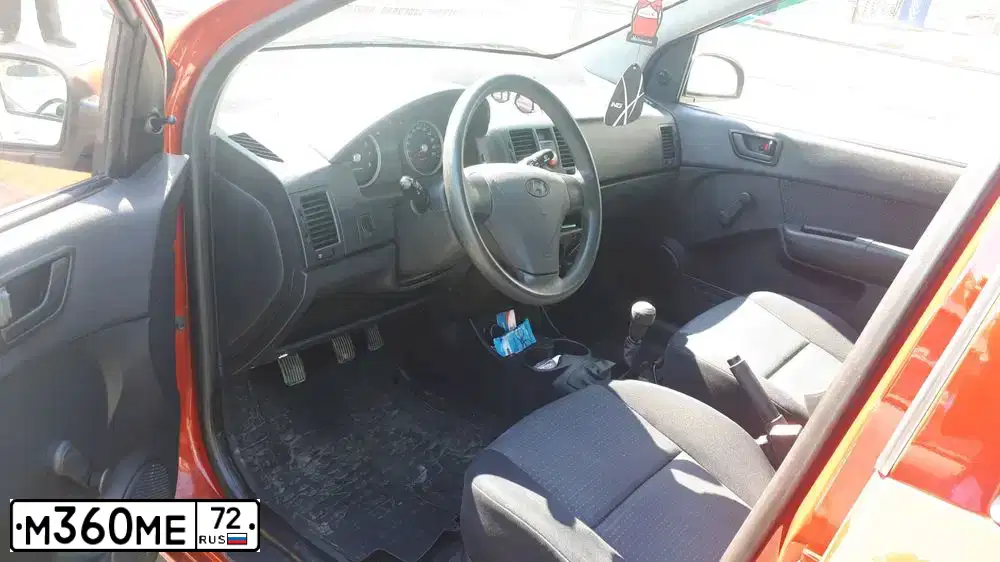 Фото автомобиля HYUNDAI GETZ, 2010 — госномер М360МЕ72. Цвет: Красный