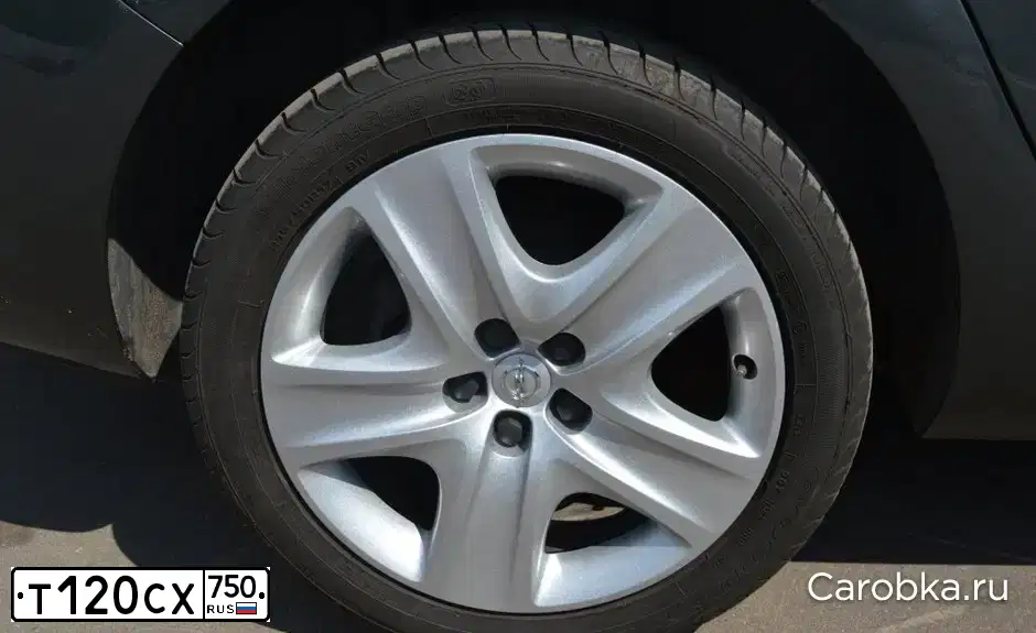 Фото автомобиля OPEL ASTRA, 2012 — госномер К224СВ790. Цвет: СЕРЫЙ ТЕМНЫЙ