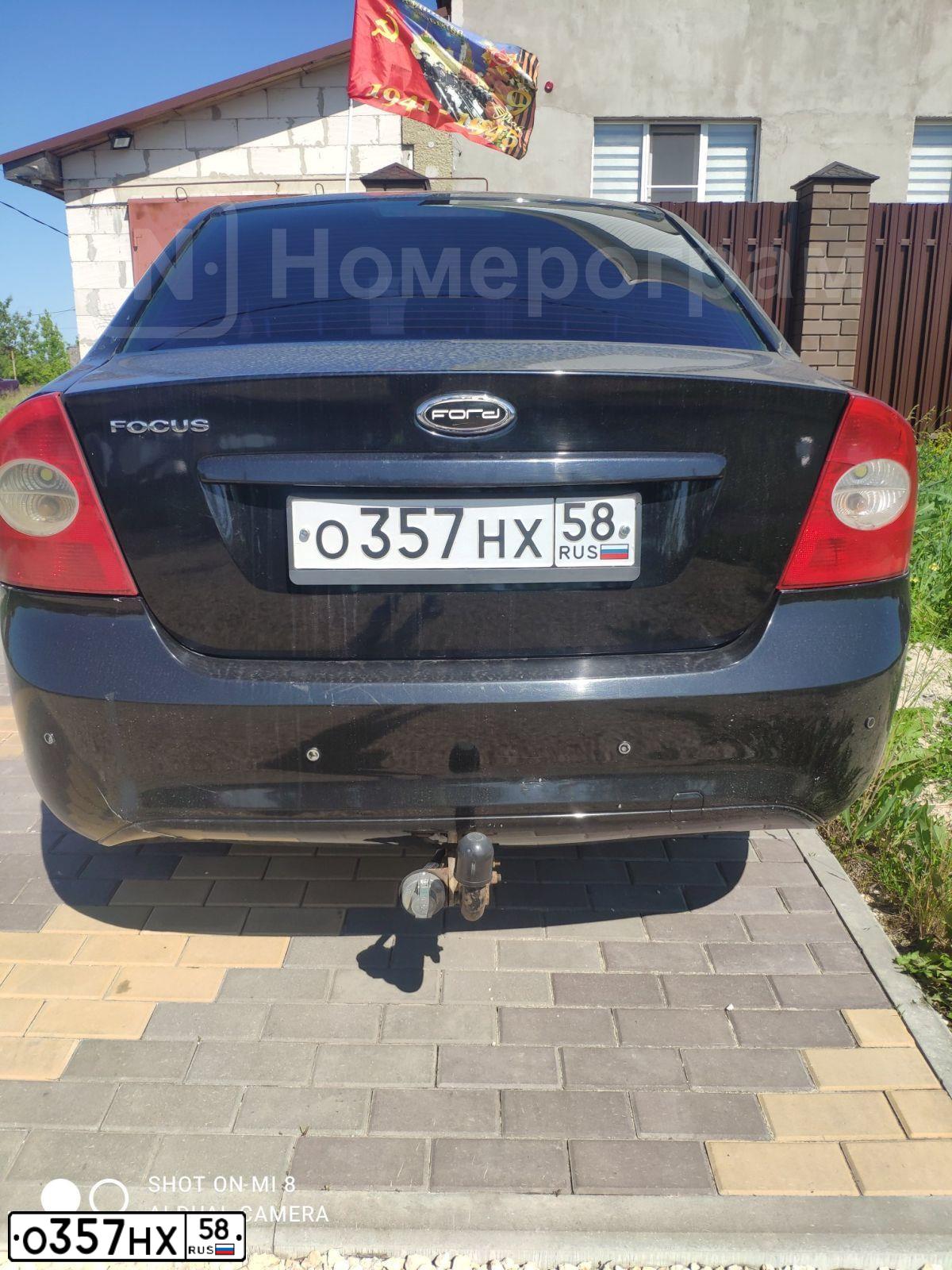 Фото автомобиля FORD FOCUS, 2005 — госномер Р116МН48. Цвет: ЧЕРНЫЙ