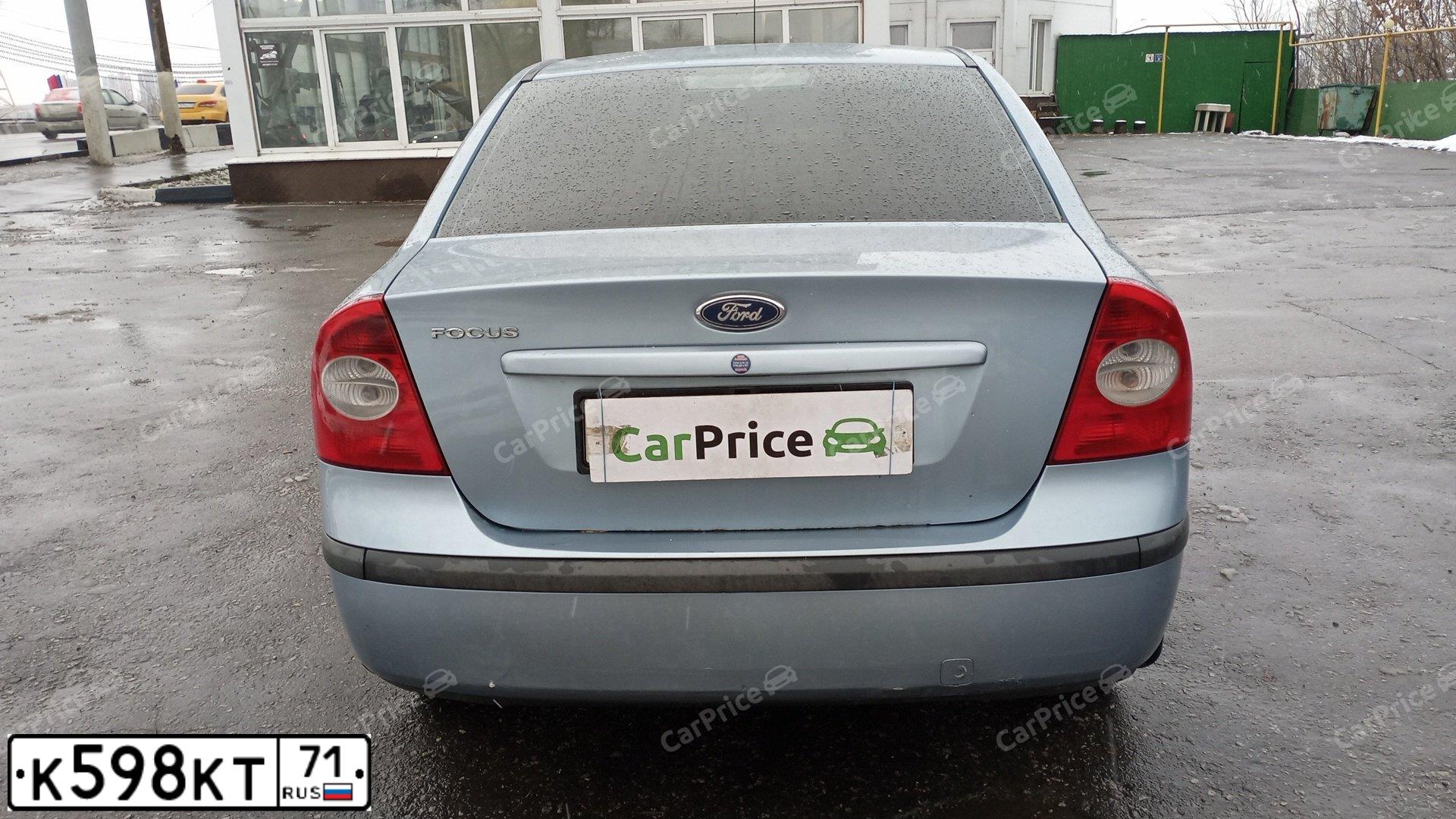 Фото автомобиля FORD FOCUS, 2005 — госномер Р425КС977. Цвет: Светло-Серо-Голубой