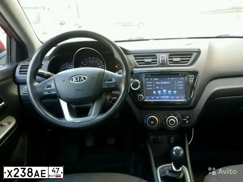 Фото автомобиля KIA RIO, 2012 — госномер Х238АЕ47. Цвет: КРАСНЫЙ