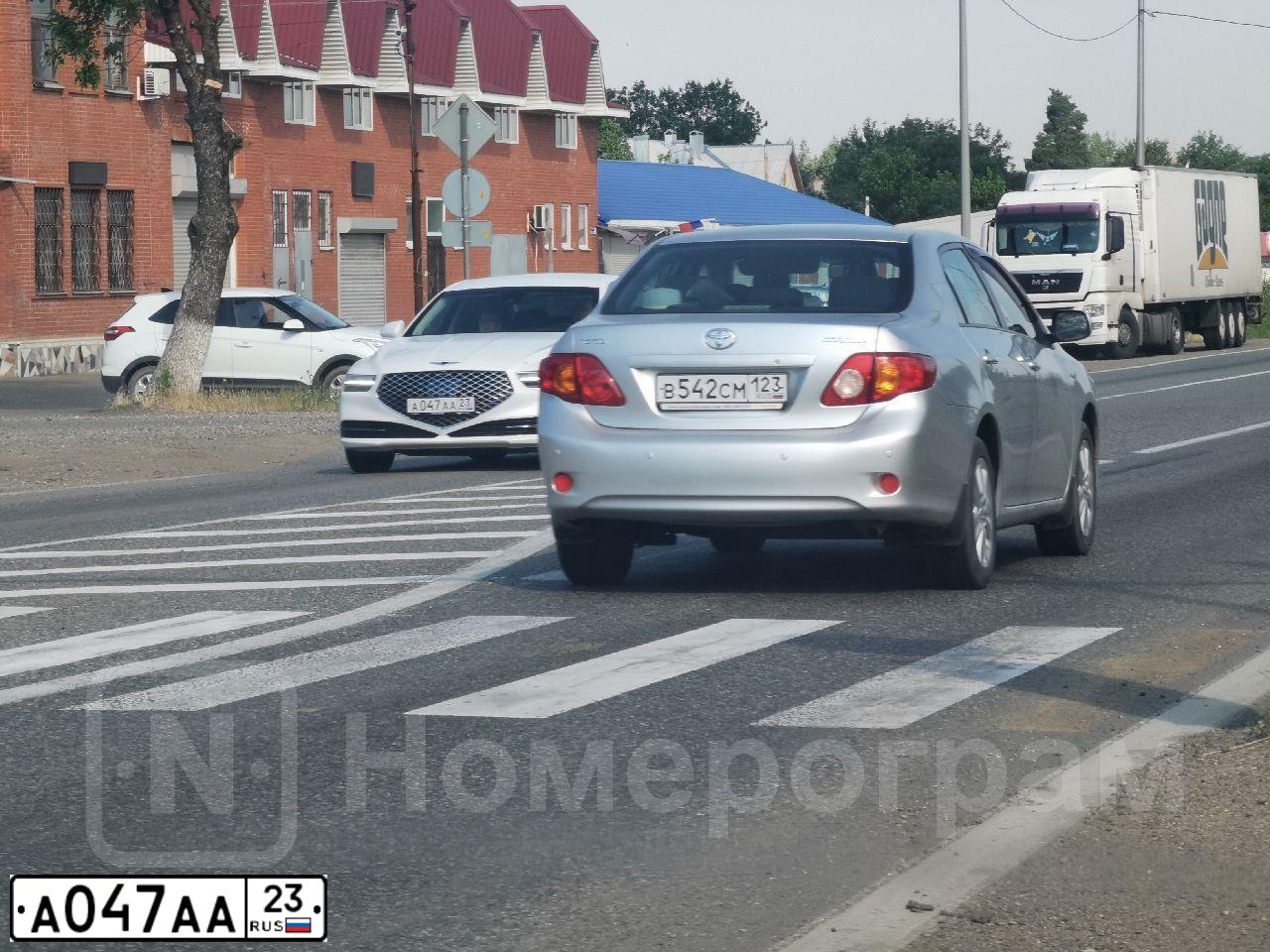 Фото автомобиля AUDI A8, 2010 — госномер А047АА23. Цвет: ЧЕРНЫЙ