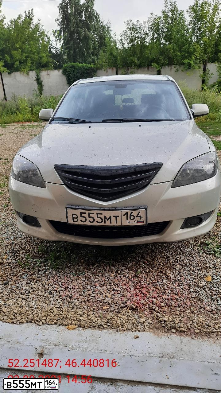 Фото автомобиля MAZDA 3, 2005 — госномер Н003ОА64. Цвет: СЕРЕБРИСТЫЙ