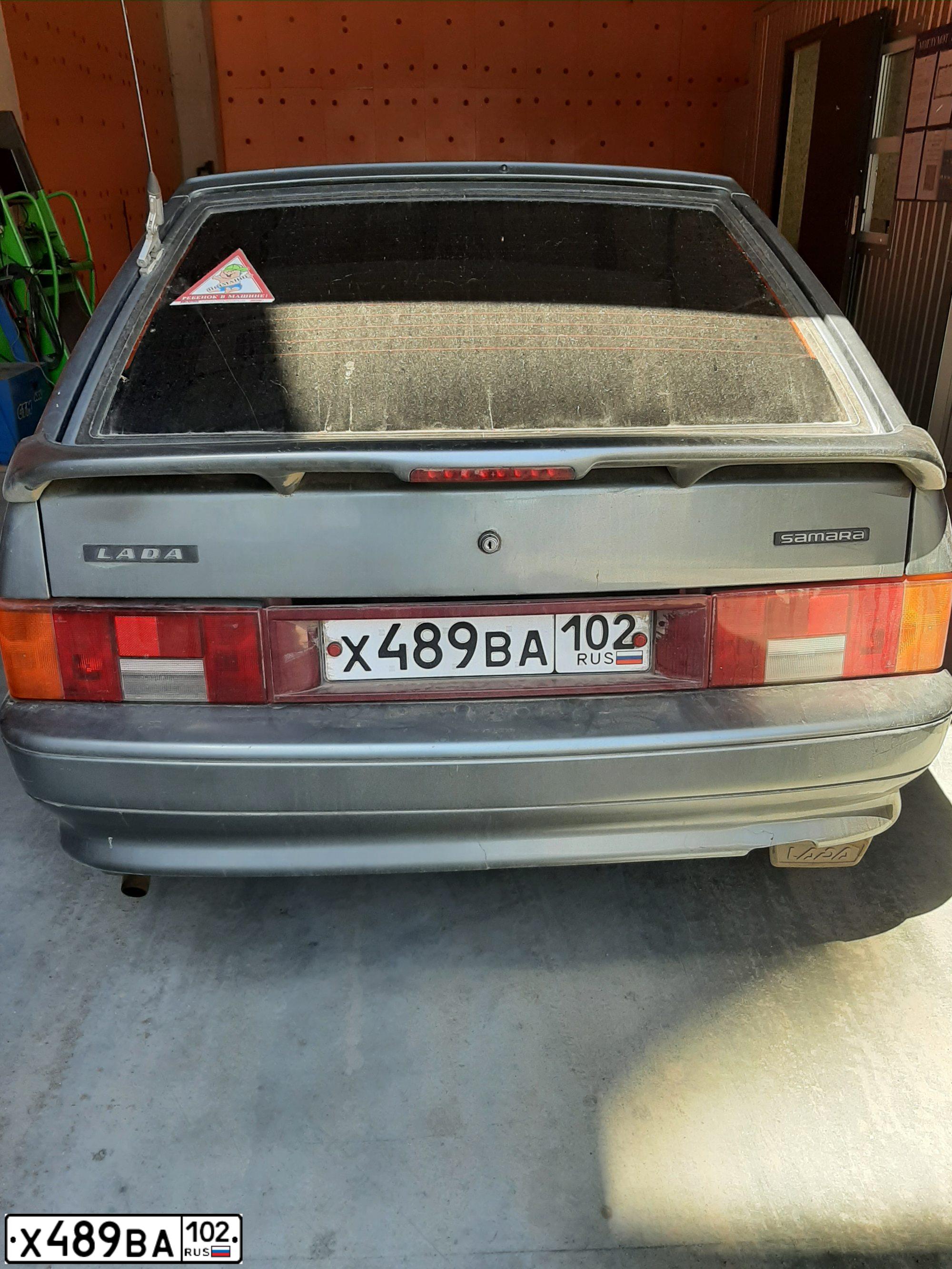 Фото автомобиля LADA 2114 SAMARA, 2010 — госномер К157АТ702. Цвет: СРЕДН СЕРО-ЗЕЛЕН МЕТ