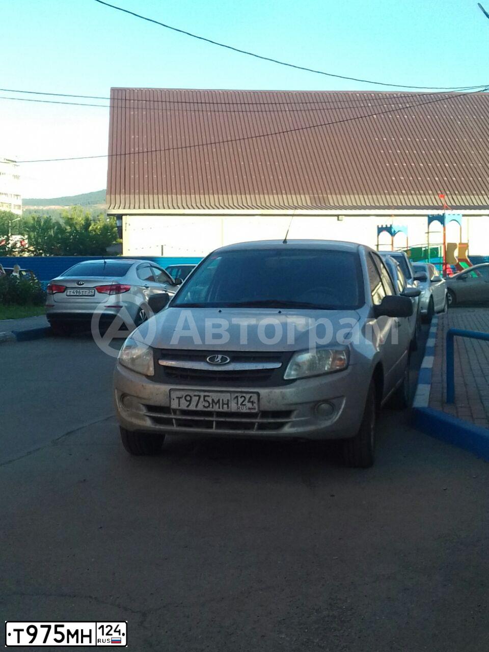Фото автомобиля LADA 2190 GRANTA, 2014 — госномер Т975МН124. Цвет: СЕРЫЙ