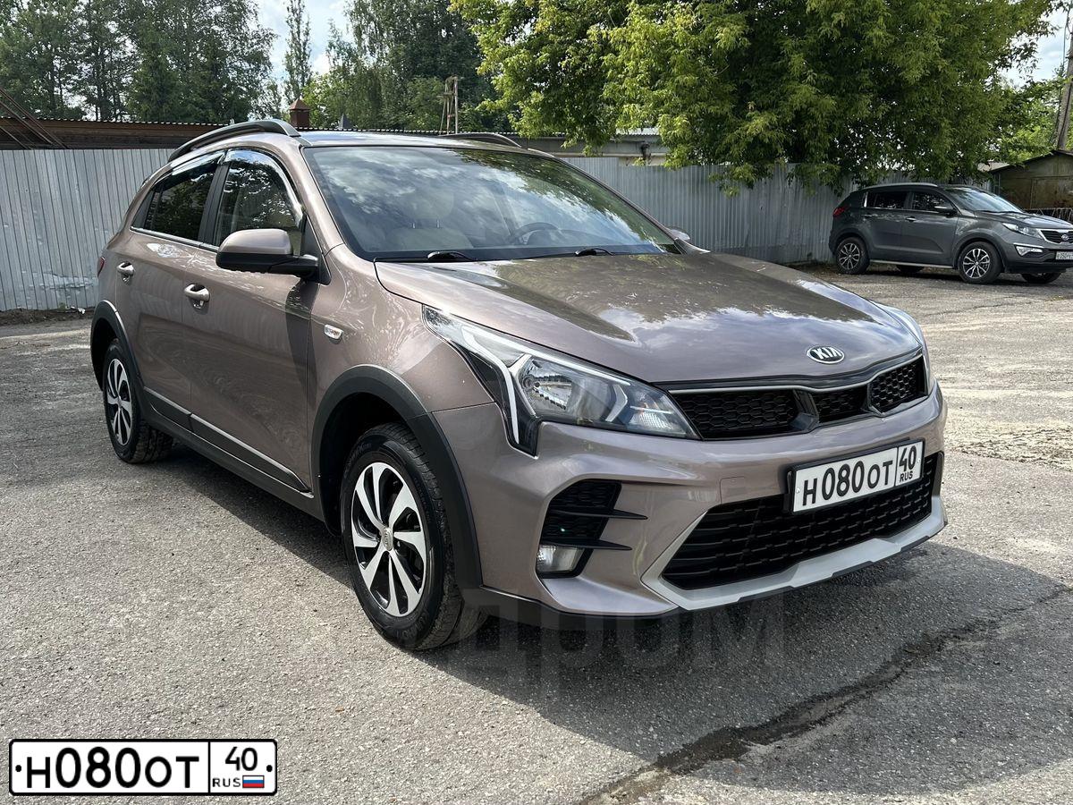 Фото автомобиля KIA RIO, 2015 — госномер Н080ОТ40. Цвет: ТЕМНО-СЕРЫЙ