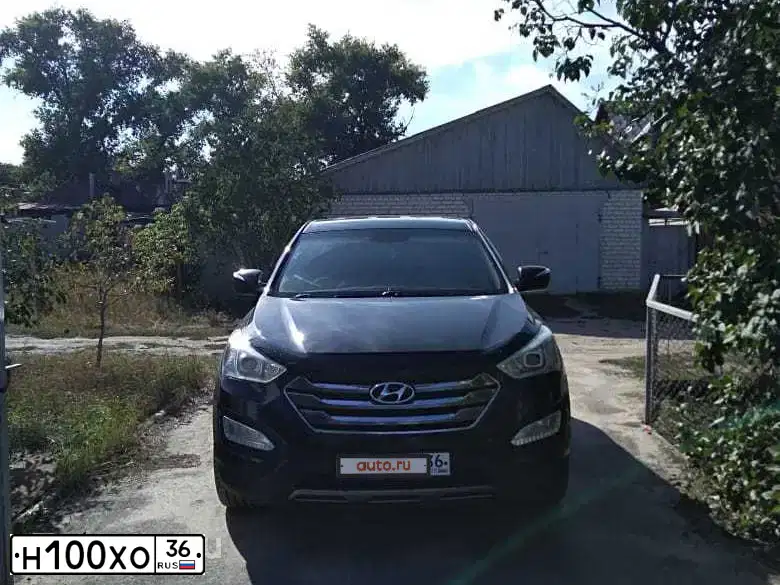 Фото автомобиля HYUNDAI SANTA FE, 2012 — госномер В166АЕ181. Цвет: ЧЕРНЫЙ
