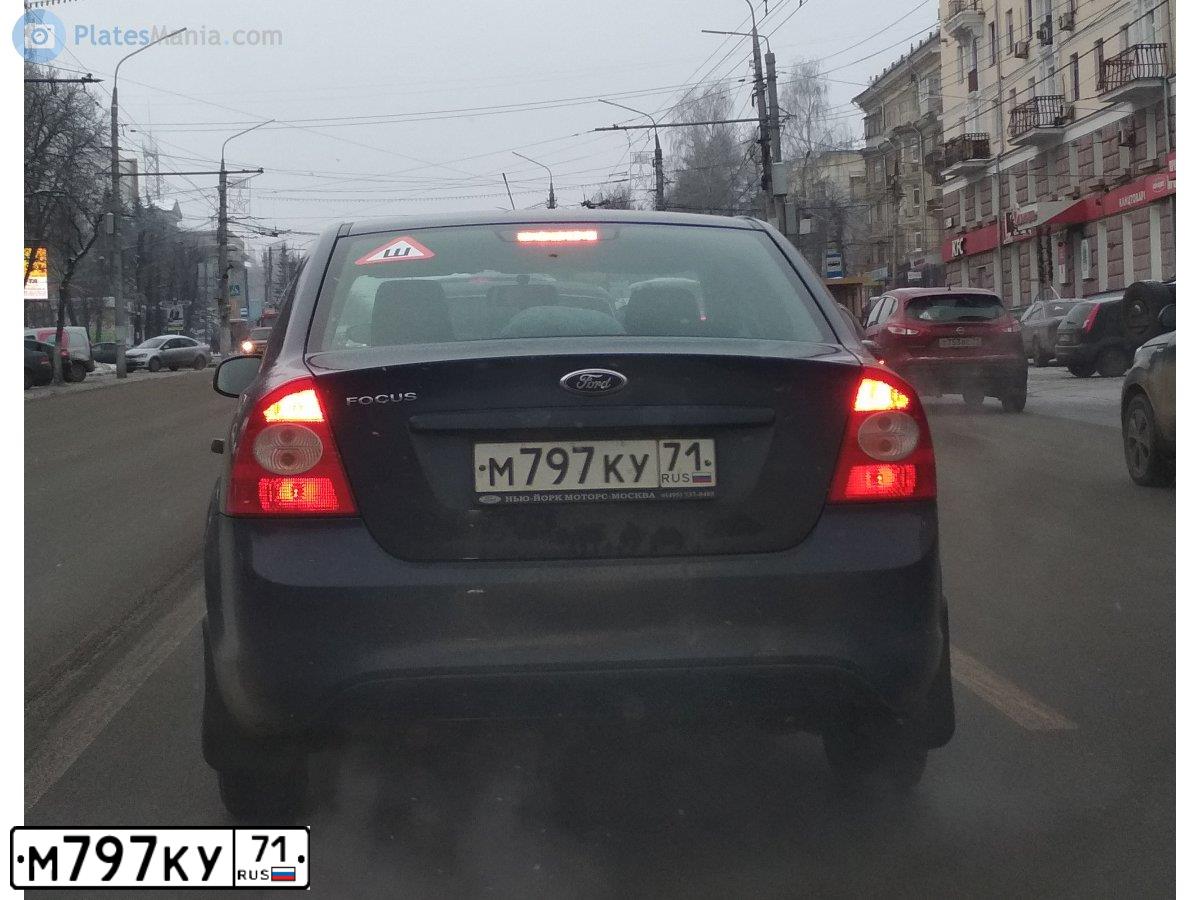 Фото автомобиля FORD FOCUS, 2010 — госномер М797КУ71. Цвет: ТЕМНО-СИНИЙ