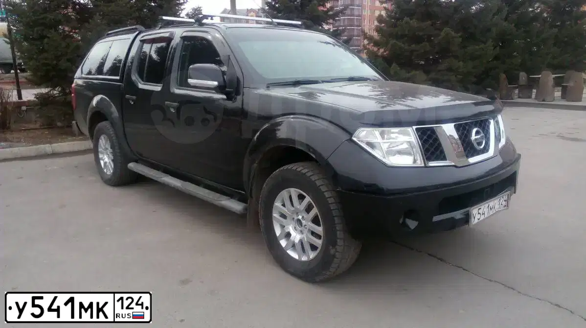 Фото автомобиля NISSAN NAVARA, 2007 — госномер М888АВ42. Цвет: ЧЕРНЫЙ