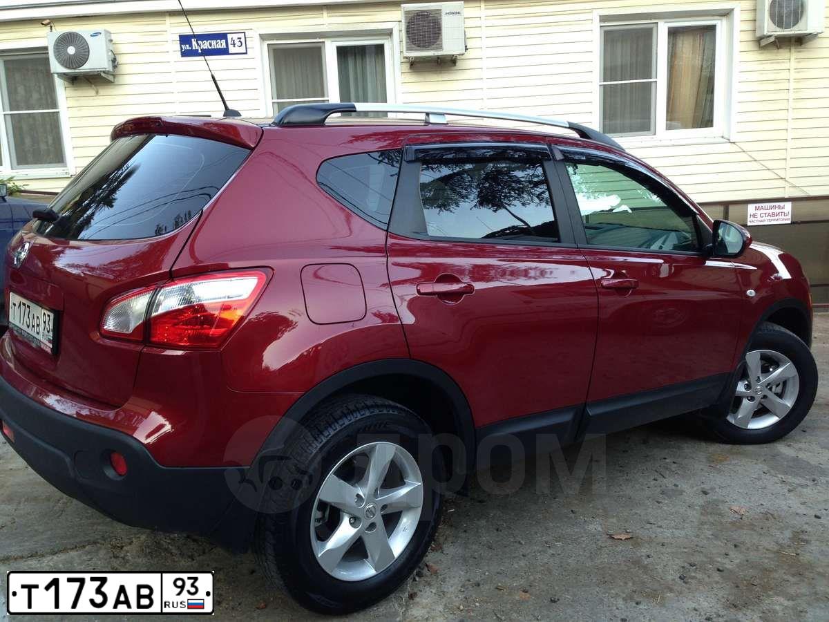 Фото автомобиля NISSAN QASHQAI, 2011 — госномер Т173АВ93. Цвет: КРАСНЫЙ