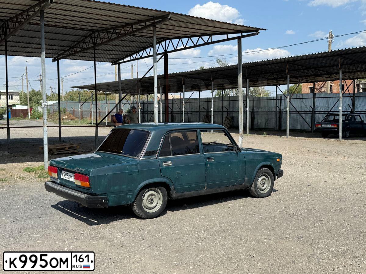 Фото автомобиля LADA 2107, 2007 — госномер К995ОМ161. Цвет: Темно-зеленый