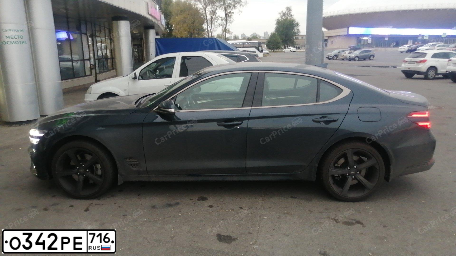 Фото автомобиля GENESIS G70, 2022 — госномер Р661ВН32. Цвет: синий