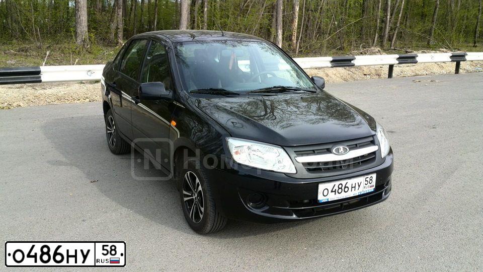 Фото автомобиля LADA 2190 GRANTA, 2014 — госномер О486НУ58. Цвет: ЧЕРНЫЙ