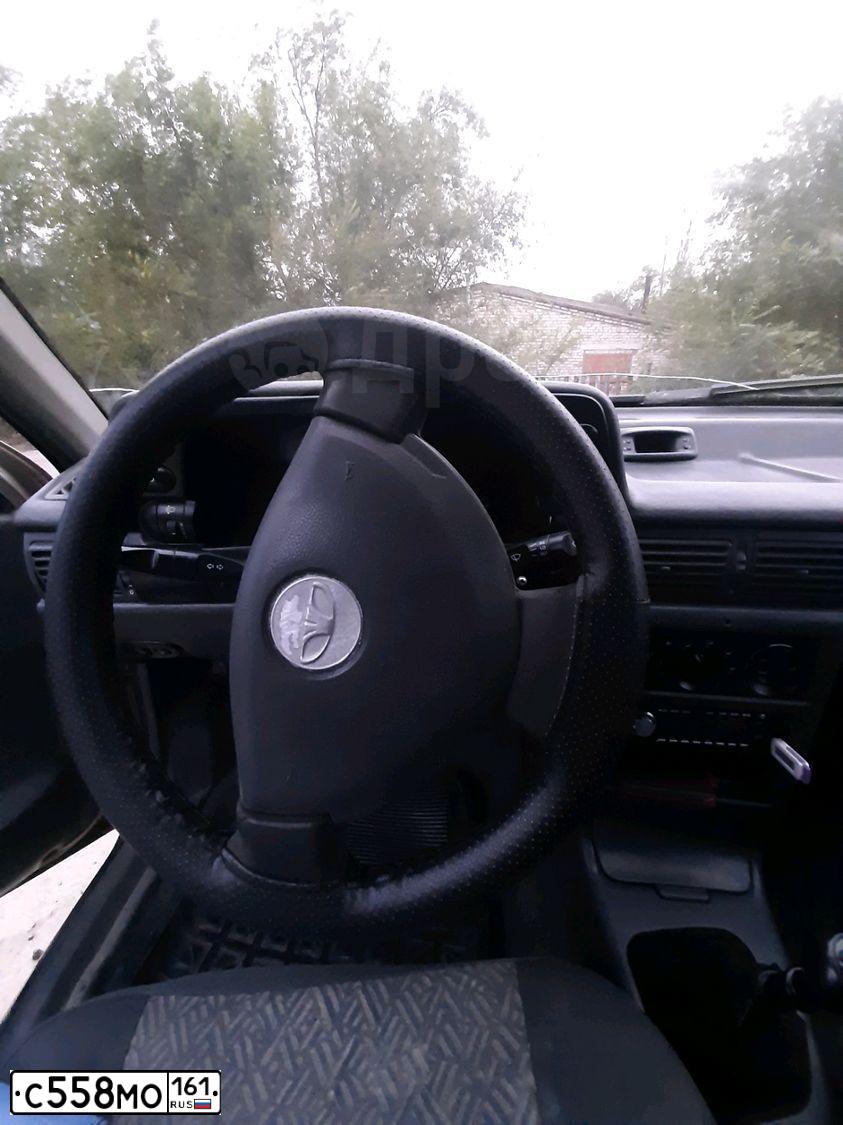 Фото автомобиля DAEWOO NEXIA, 1997 — госномер С558МО161. Цвет: БЕЖЕВЫЙ