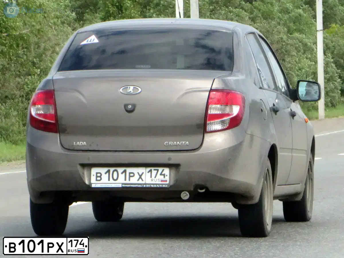 Фото автомобиля LADA 2190 GRANTA, 2014 — госномер В101РХ174. Цвет: Золотисто-коричневый
