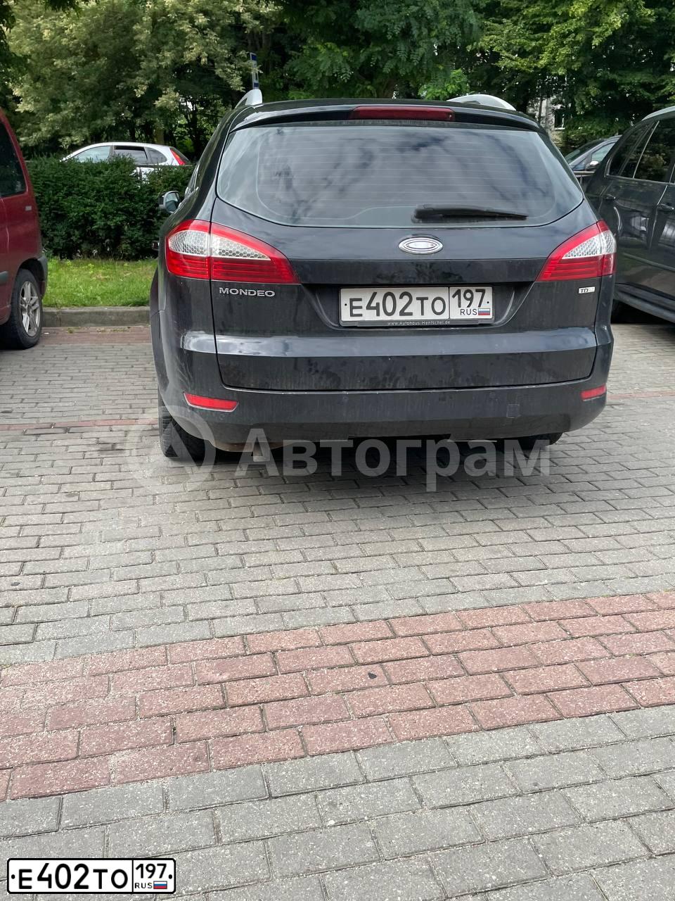 Фото автомобиля FORD MONDEO, 2008 — госномер Е402ТО197. Цвет: ЧЕРНЫЙ