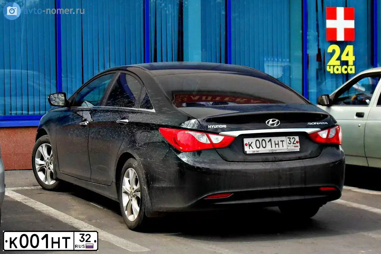 Фото автомобиля KIA MAGENTIS / OPTIMA, 2006 — госномер К001НТ32. Цвет: синий