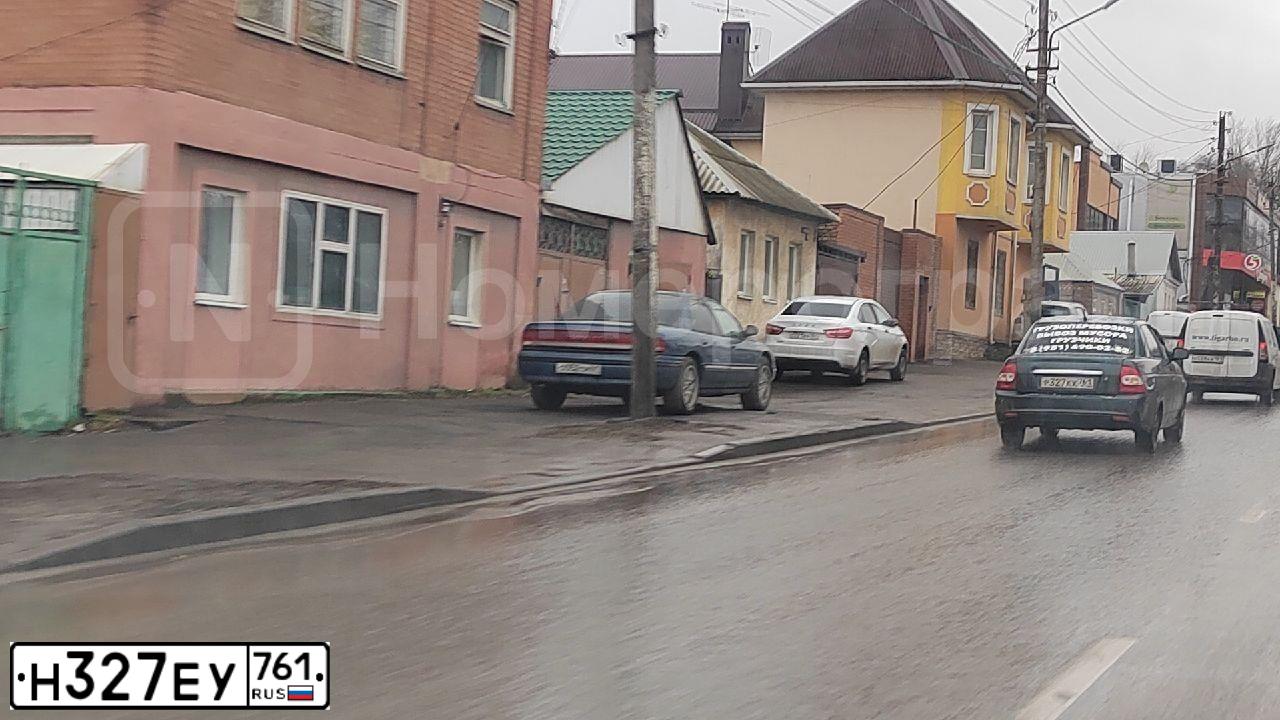 Фото автомобиля HONDA CIVIC, 2006 — госномер О747РР161. Цвет: ЧЕРНЫЙ