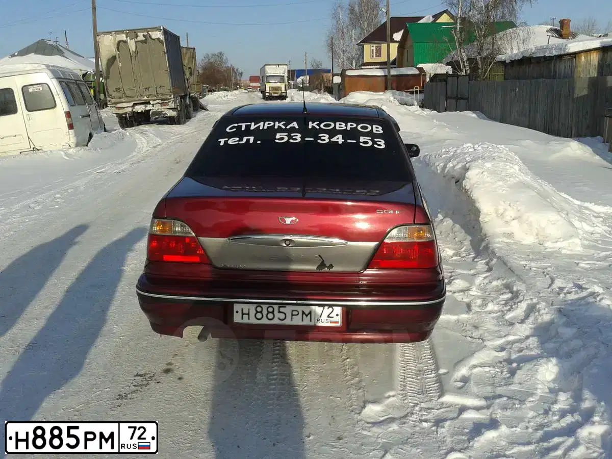 Фото автомобиля DAEWOO NEXIA, 2008 — госномер Н885РМ72. Цвет: ВИШНЕВЫЙ