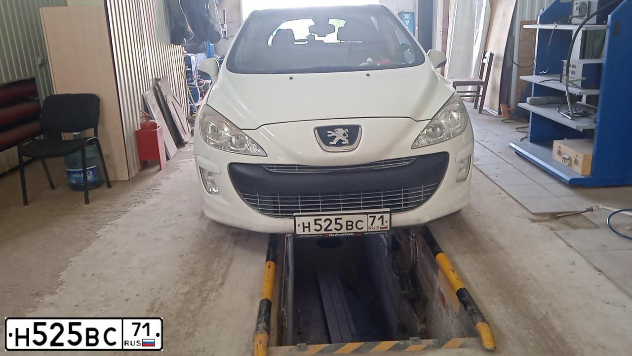 Фото автомобиля TOYOTA RAV4, 2007 — госномер Е973ОК70. Цвет: Красный