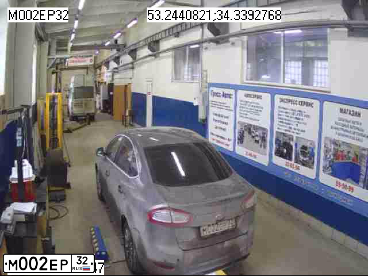 Фото автомобиля FORD MONDEO, 2012 — госномер М002ЕР32. Цвет: СЕРО-КОРИЧНЕВЫЙ