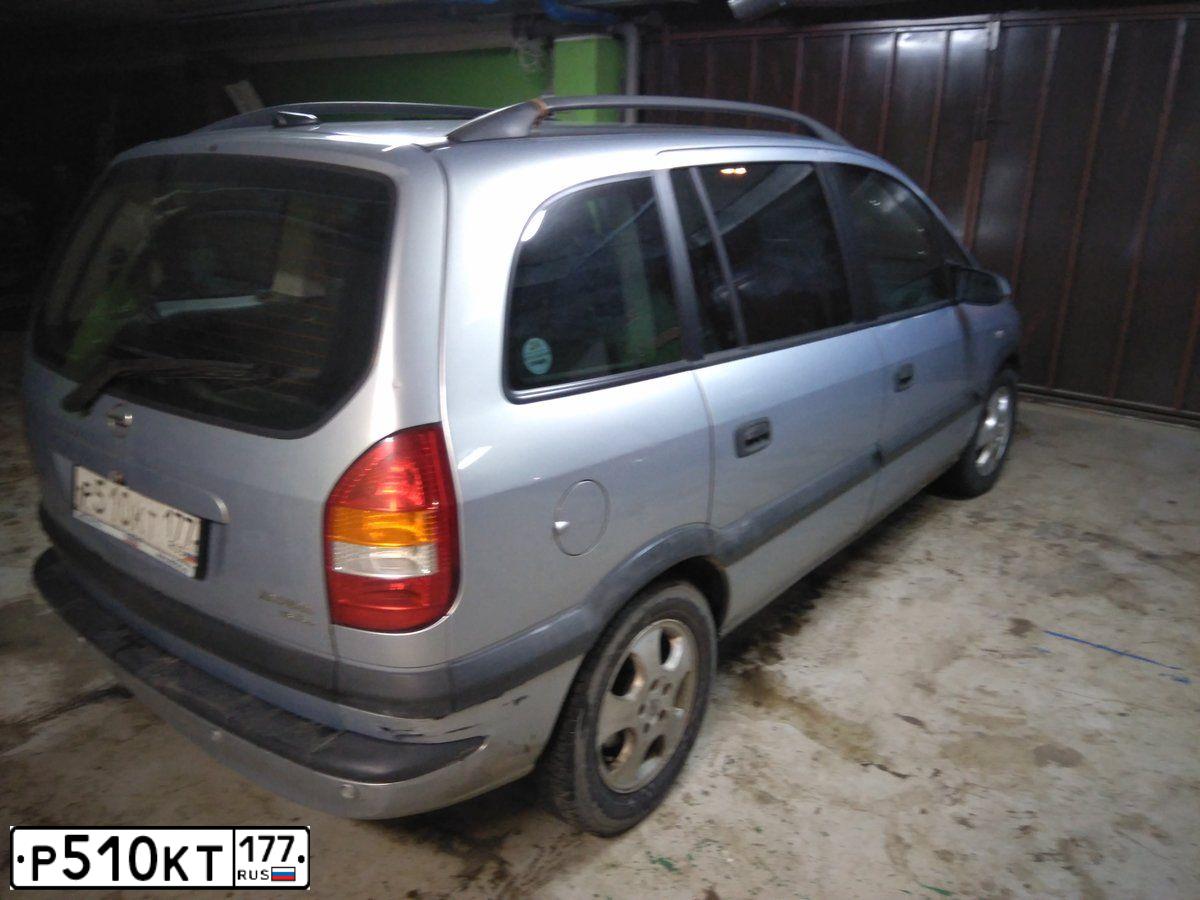 Фото автомобиля OPEL ZAFIRA, 2001 — госномер Х415ОР57. Цвет: СЕРЫЙ