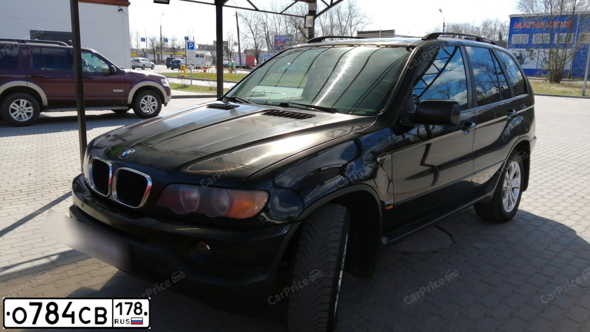 Фото автомобиля BMW X5, 2003 — госномер Е485ТЕ53. Цвет: ЧЕРНЫЙ МЕТАЛЛИК