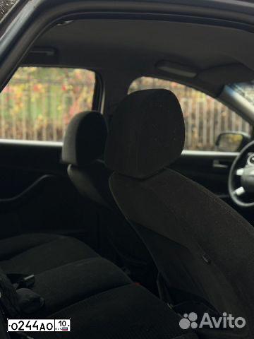 Фото автомобиля FORD FOCUS, 2006 — госномер О244АО10. Цвет: Светло-Серо-Голубой
