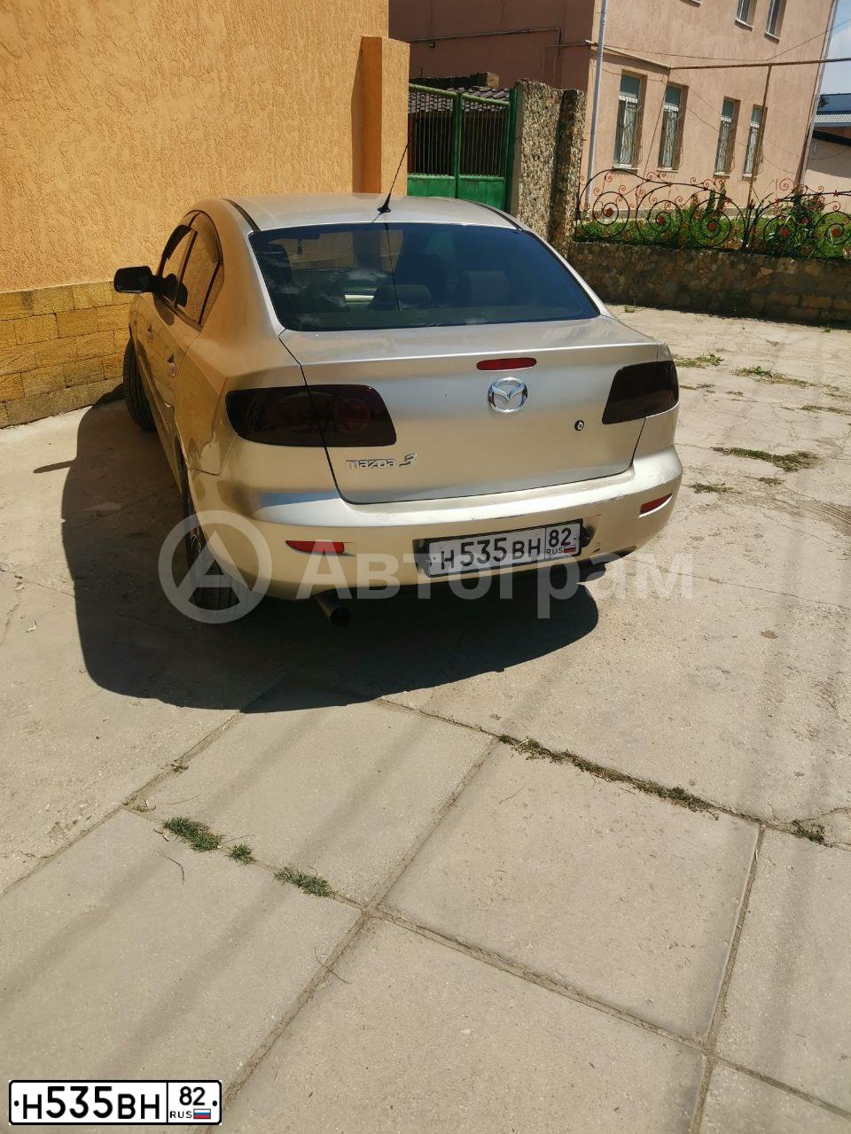 Фото автомобиля MAZDA 3, 2004 — госномер Н835ЕУ82. Цвет: СЕРЫЙ