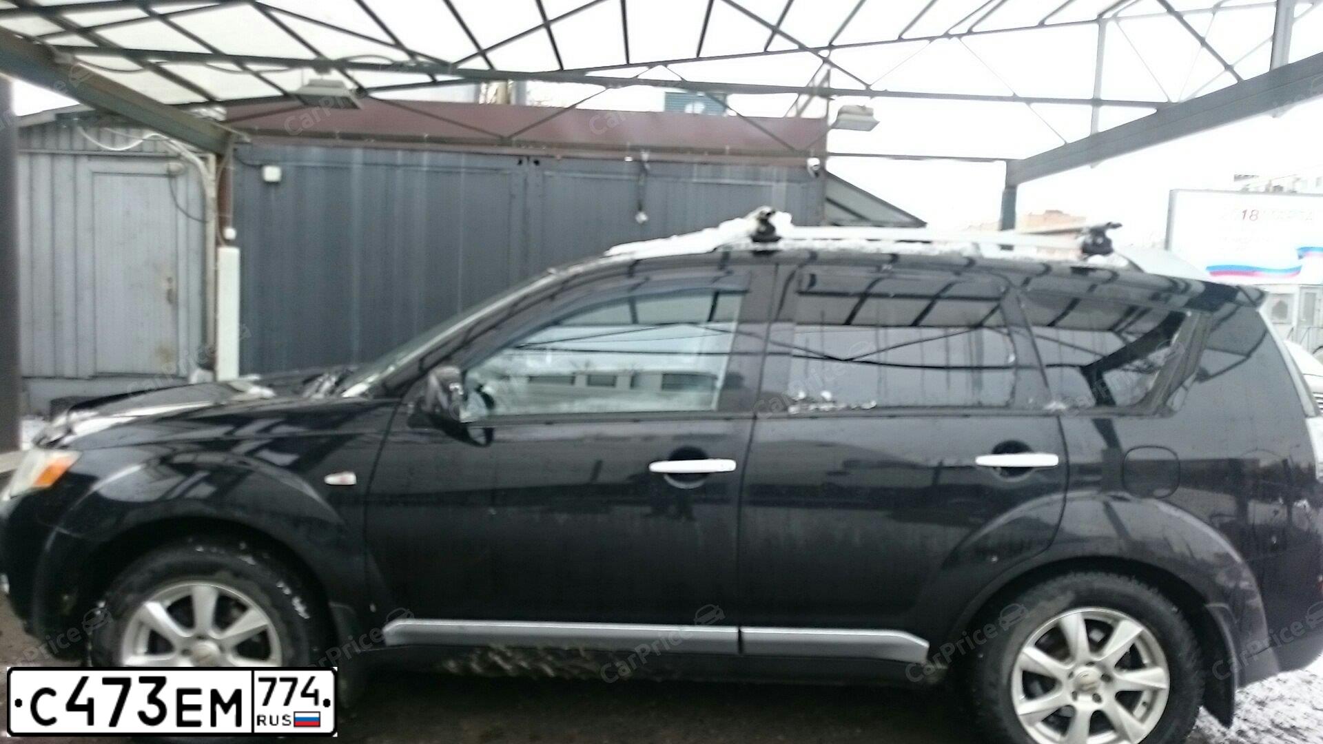 Фото автомобиля MITSUBISHI OUTLANDER, 2008 — госномер С473ЕМ774. Цвет: ЧЕРНЫЙ
