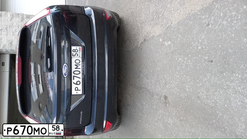Фото автомобиля FORD FOCUS, 2010 — госномер Р670МО58. Цвет: ЧЕРНЫЙ