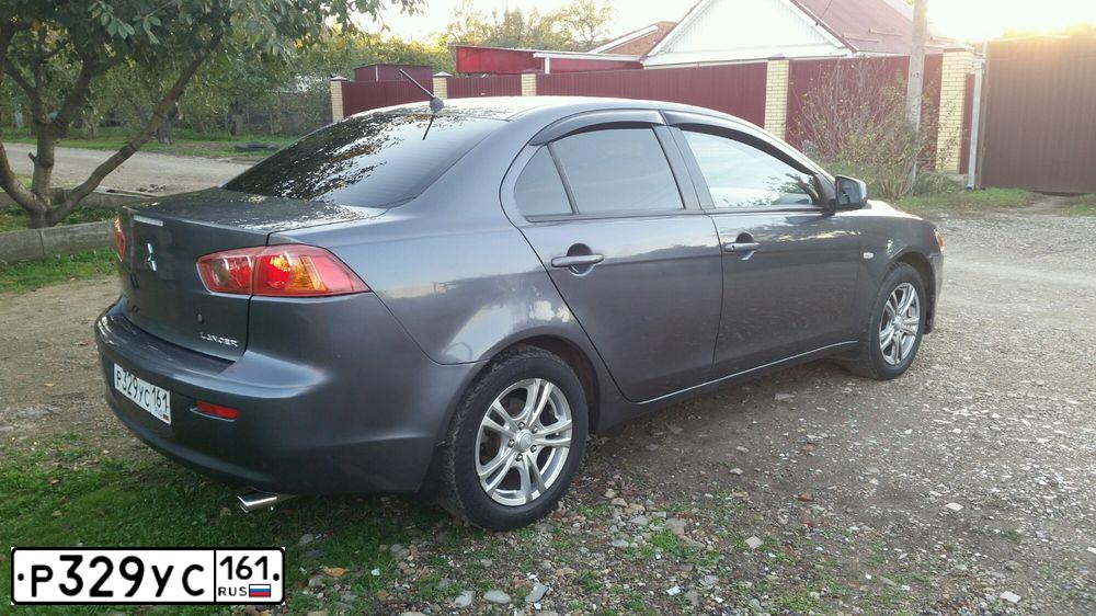 Фото автомобиля MITSUBISHI LANCER, 2008 — госномер Т171АТ161. Цвет: СЕРЫЙ