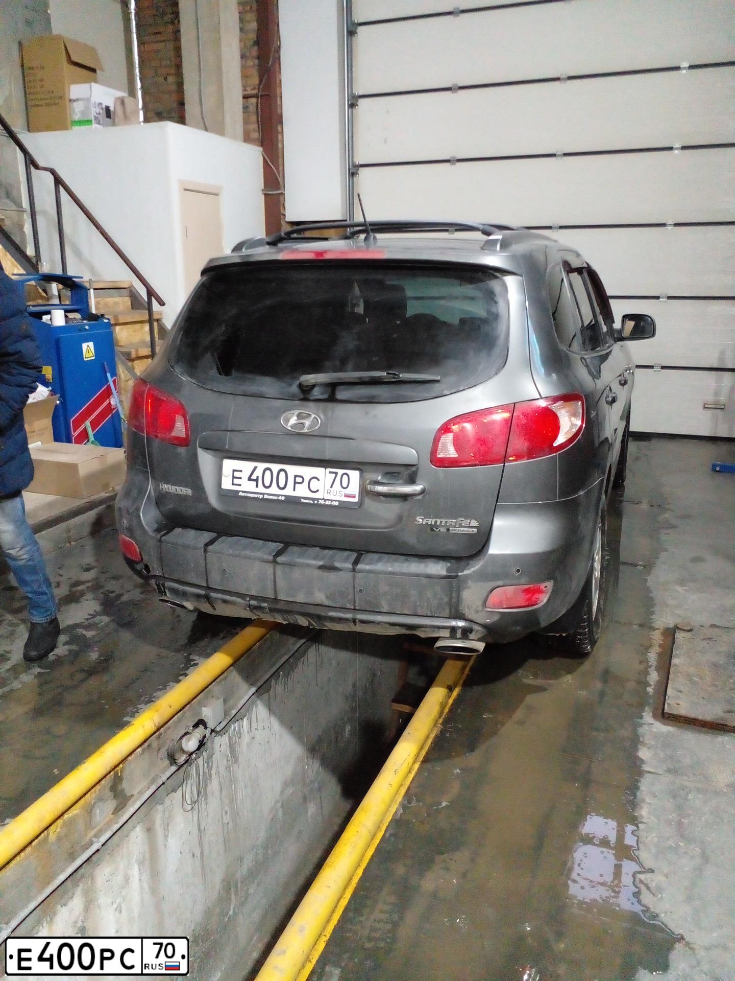 Фото автомобиля VOLVO XC90, 2012 — госномер Е400РС70. Цвет: синий