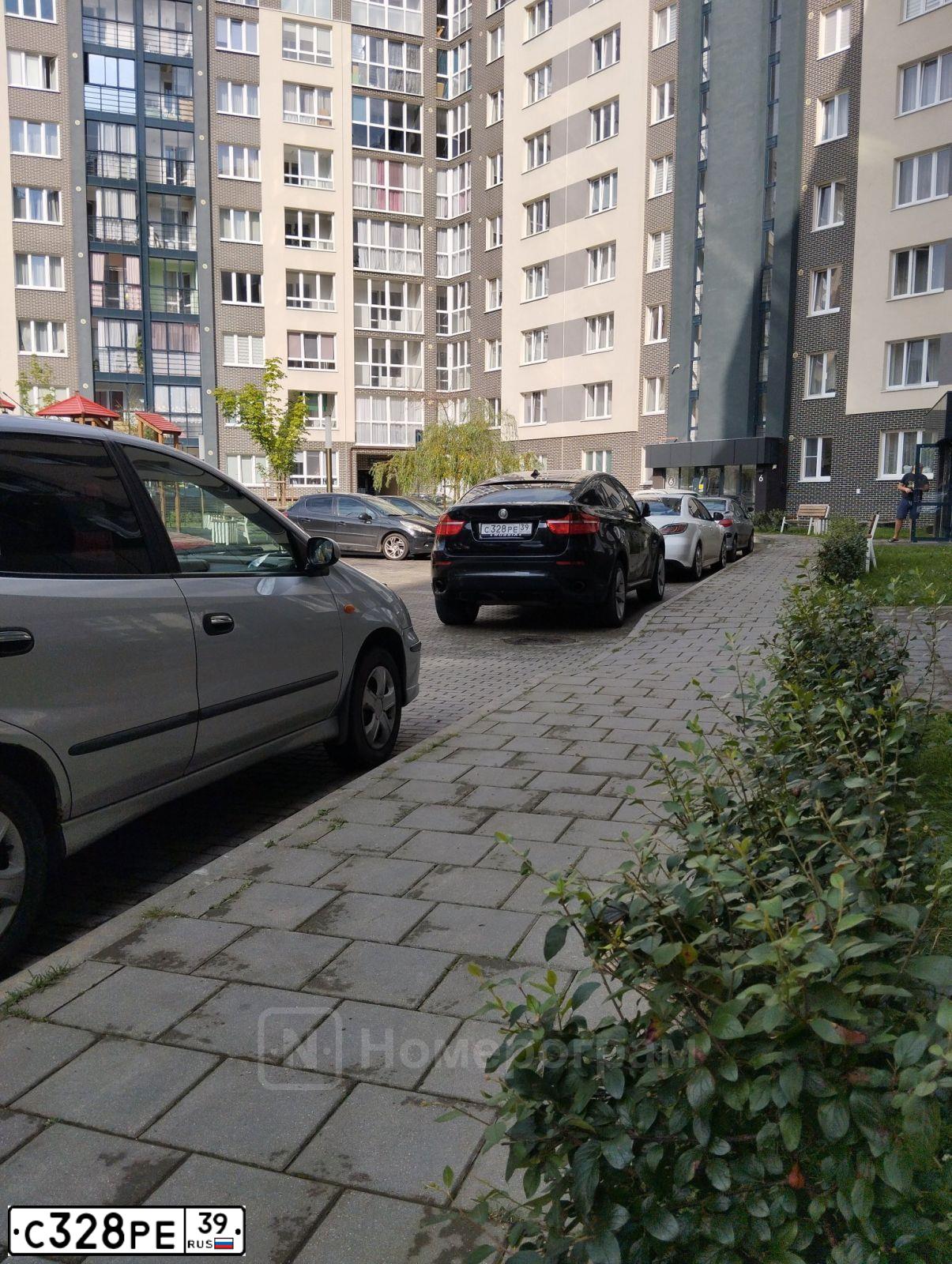 Фото автомобиля BMW X6, 2009 — госномер С328РЕ39. Цвет: ЧЕРНЫЙ