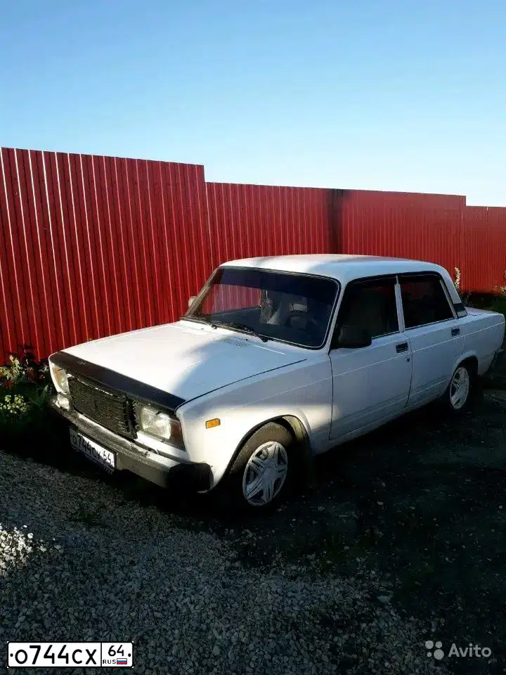 Фото автомобиля LADA 2112, 2002 — госномер Е928ТА763. Цвет: СЕРЕБРИСТЫЙ ЖЕЛТО-ЗЕЛЕНЫЙ