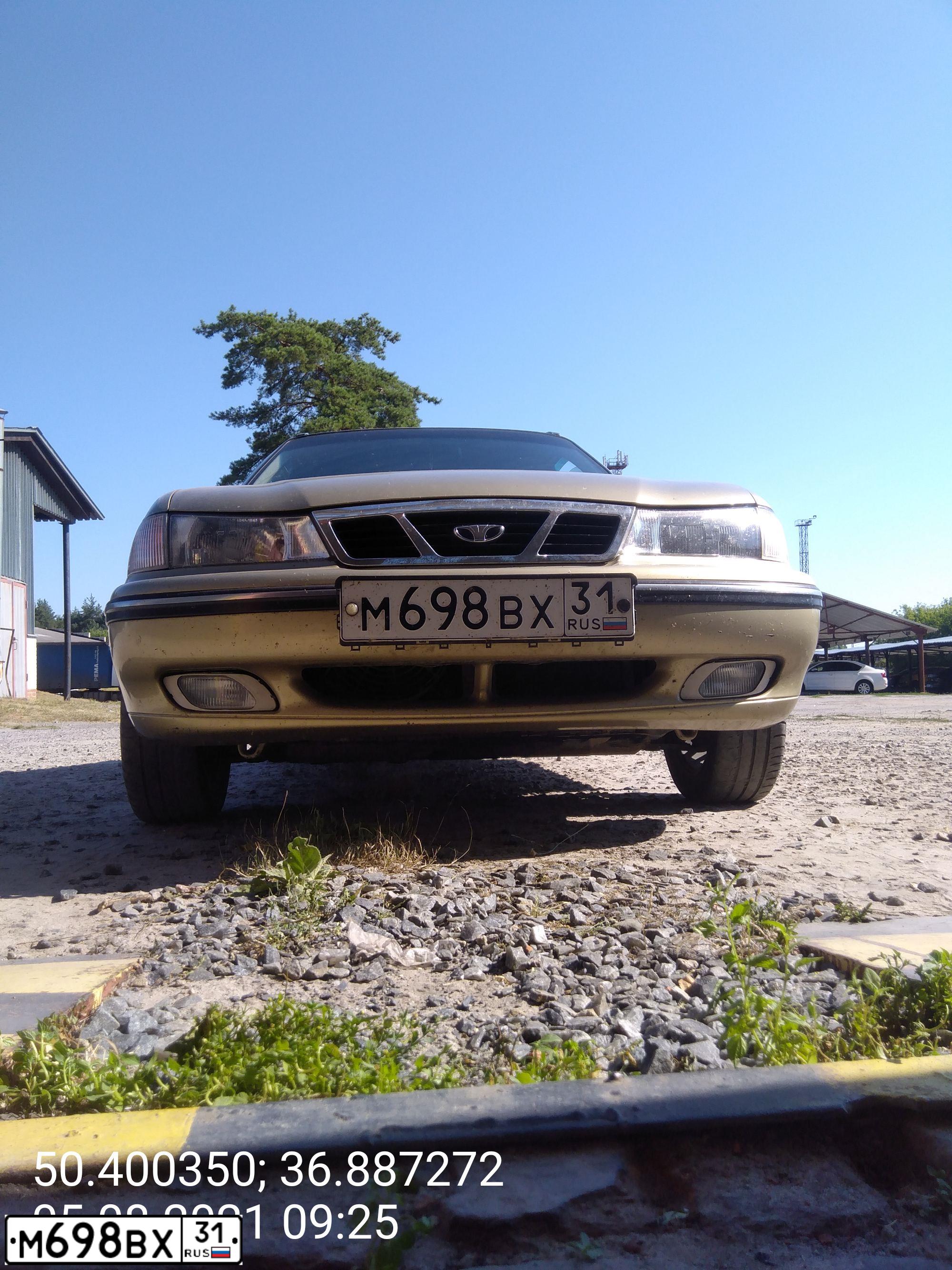 Фото автомобиля DAEWOO NEXIA, 2008 — госномер М698ВХ31. Цвет: ПЕСОЧНЫЙ