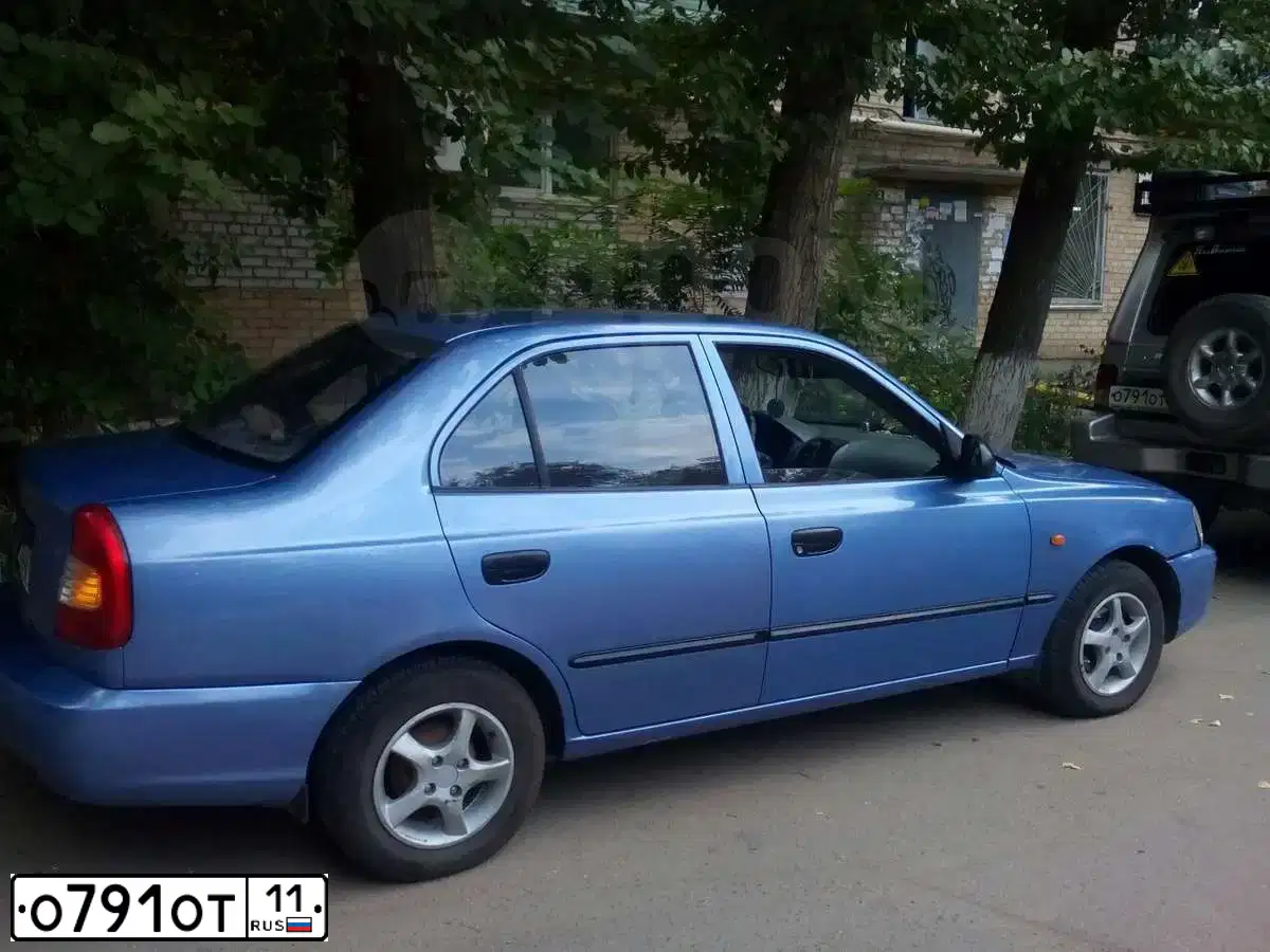 Фото автомобиля MITSUBISHI LANCER, 2008 — госномер Р414ВМ11. Цвет: СИНИЙ