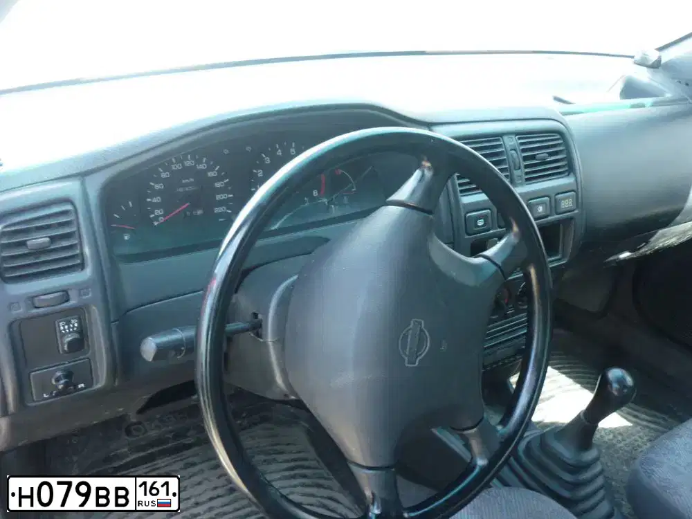 Фото автомобиля NISSAN ALMERA, 1997 — госномер В994АУ761. Цвет: Красный