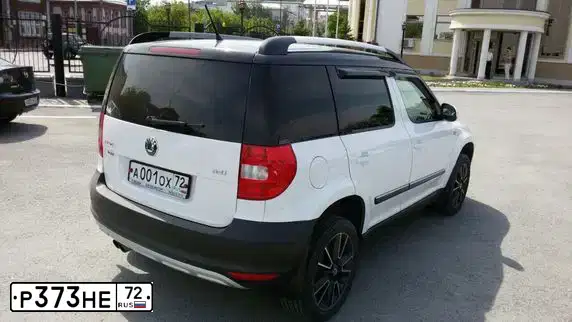 Фото автомобиля SKODA RAPID, 2014 — госномер Р373НЕ72. Цвет: ТЕМНО-СЕРЫЙ