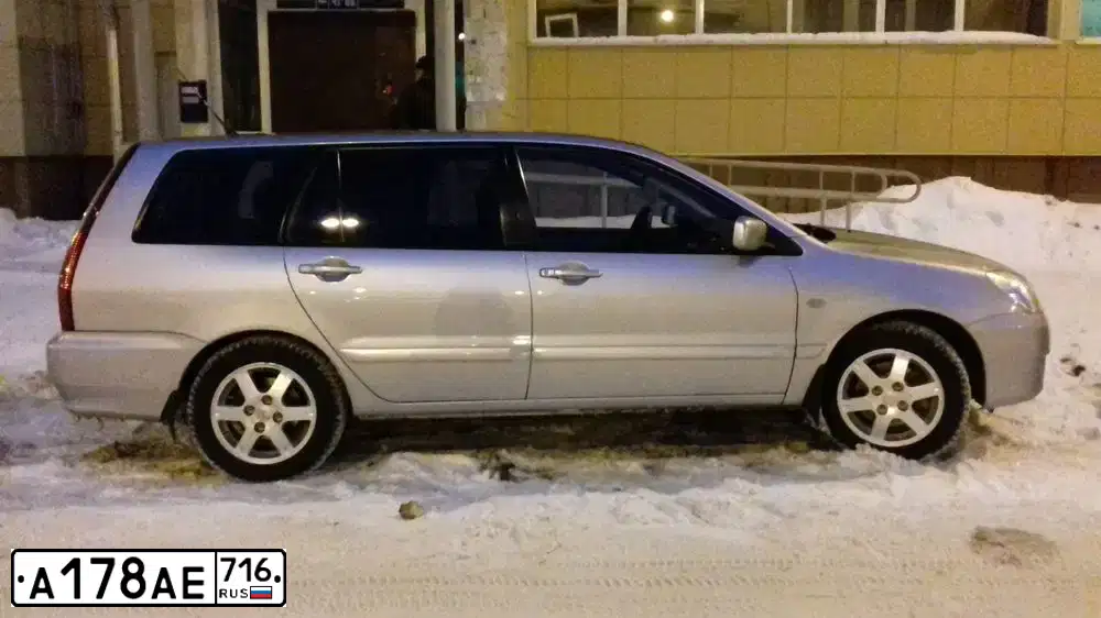 Фото автомобиля MITSUBISHI LANCER, 2005 — госномер В038ТС74. Цвет: СЕРЕБРИСТЫЙ