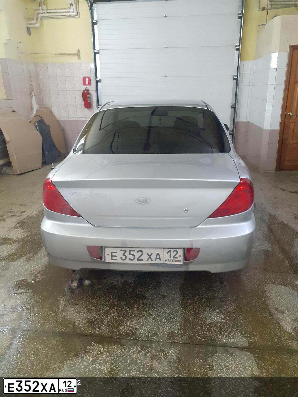Фото автомобиля KIA SPECTRA, 2007 — госномер А411СК116. Цвет: алмазное серебро (белый)