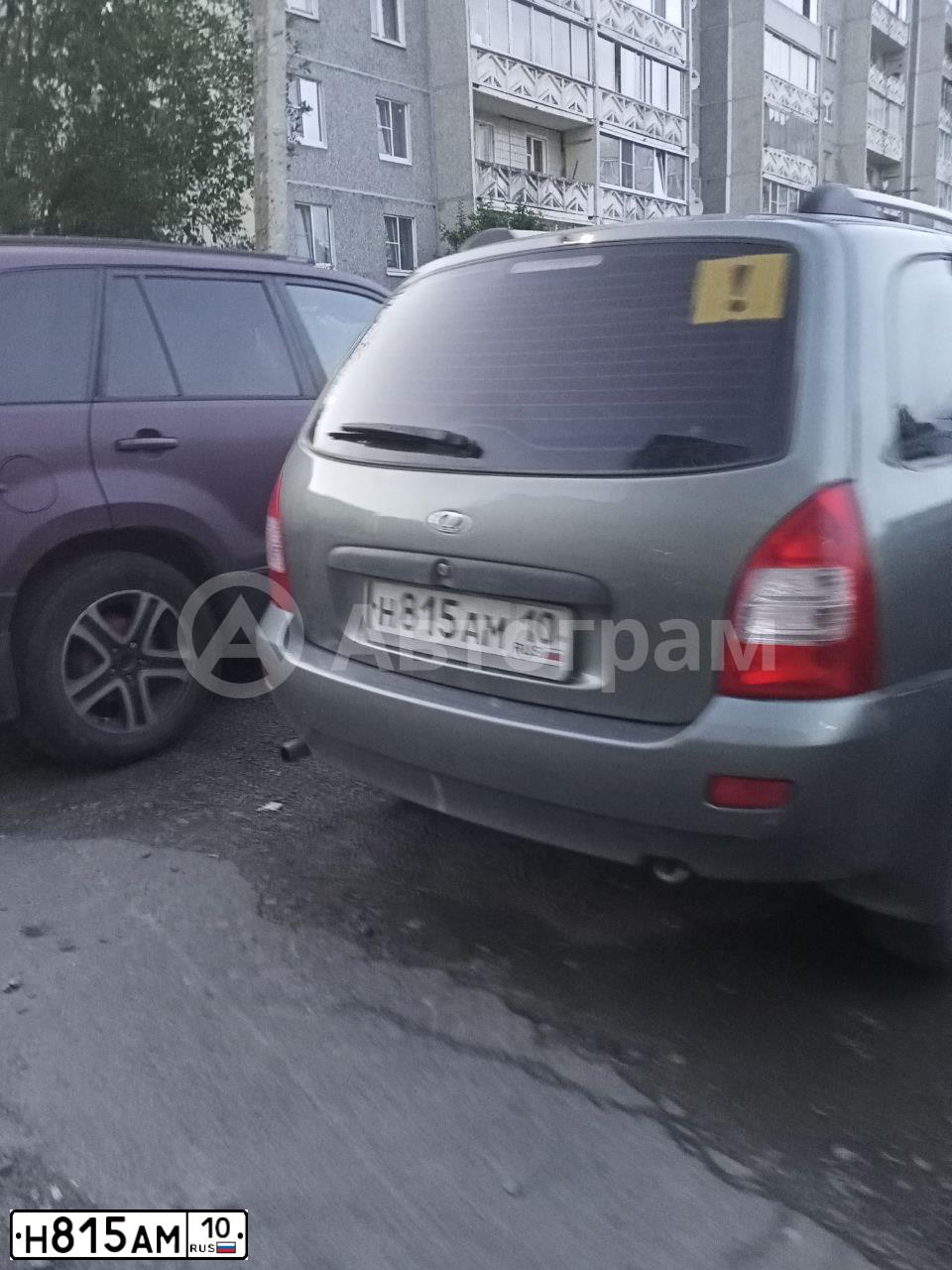 Фото автомобиля LADA 1117 KALINA, 2011 — госномер Н815АМ10. Цвет: ТЕМНО-СЕРЫЙ МЕТАЛЛИК