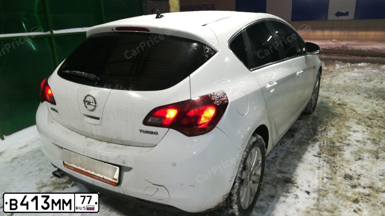 Фото автомобиля OPEL ASTRA, 2012 — госномер В516РН790. Цвет: Белый