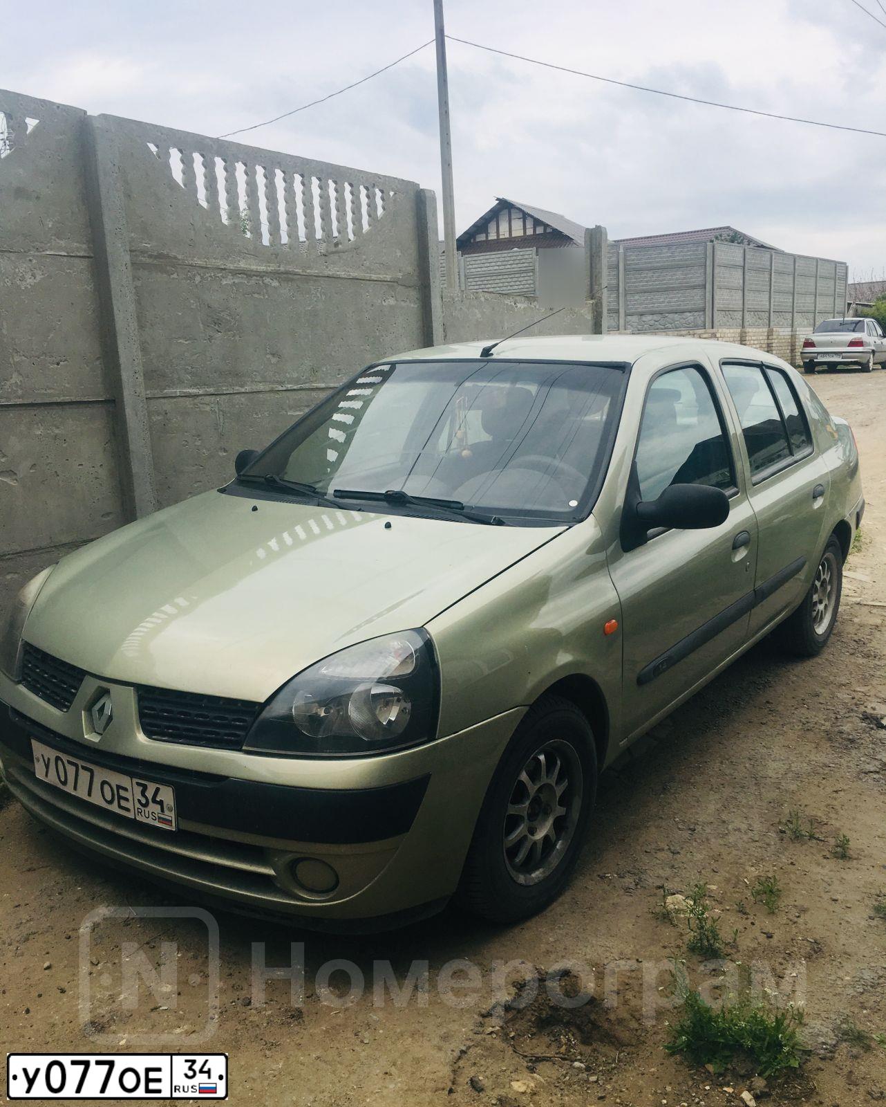 Фото автомобиля RENAULT SYMBOL, 2004 — госномер О148КН134. Цвет: СВЕТЛО-СЕРО-ЗЕЛЕНЫЙ