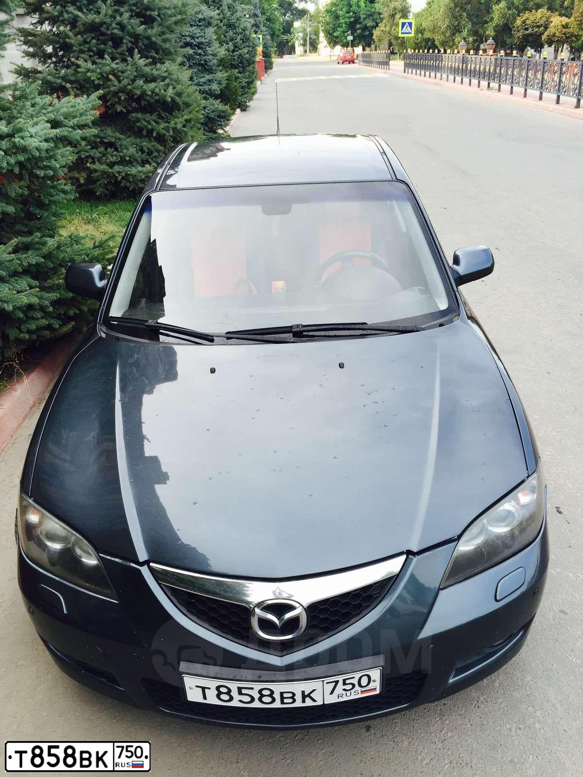 Фото автомобиля MAZDA 3, 2008 — госномер Е406ВЕ180. Цвет: Серый