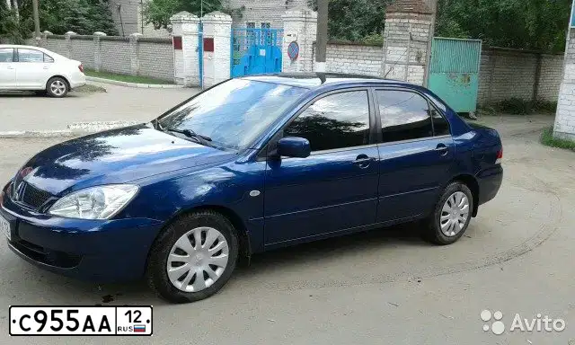 Фото автомобиля MITSUBISHI LANCER, 2007 — госномер Р594ОВ40. Цвет: синий