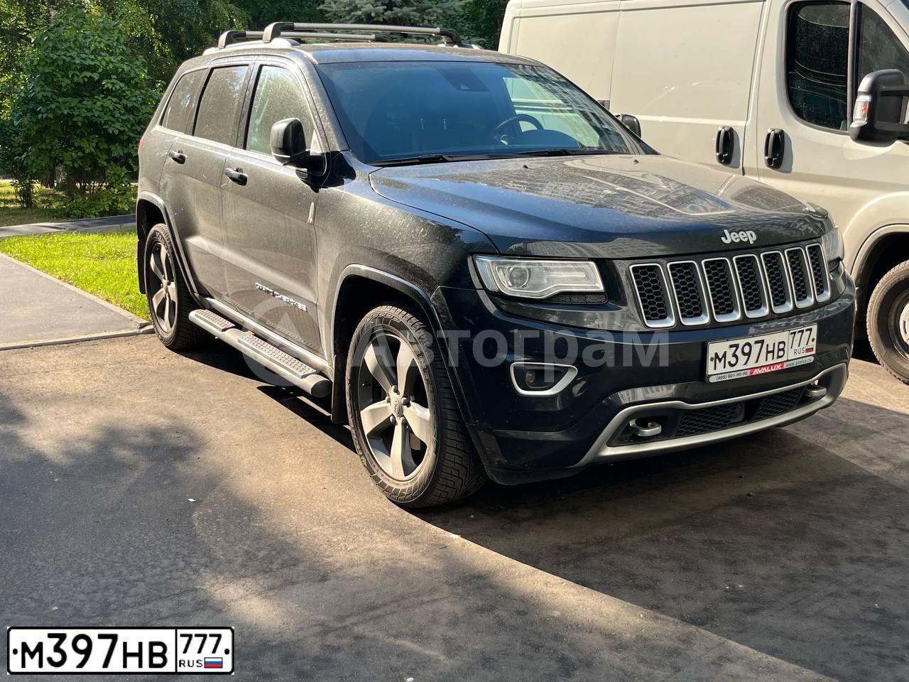 Фото автомобиля JEEP GRAND CHEROKEE, 2014 — госномер М397НВ777. Цвет: ЧЕРНЫЙ