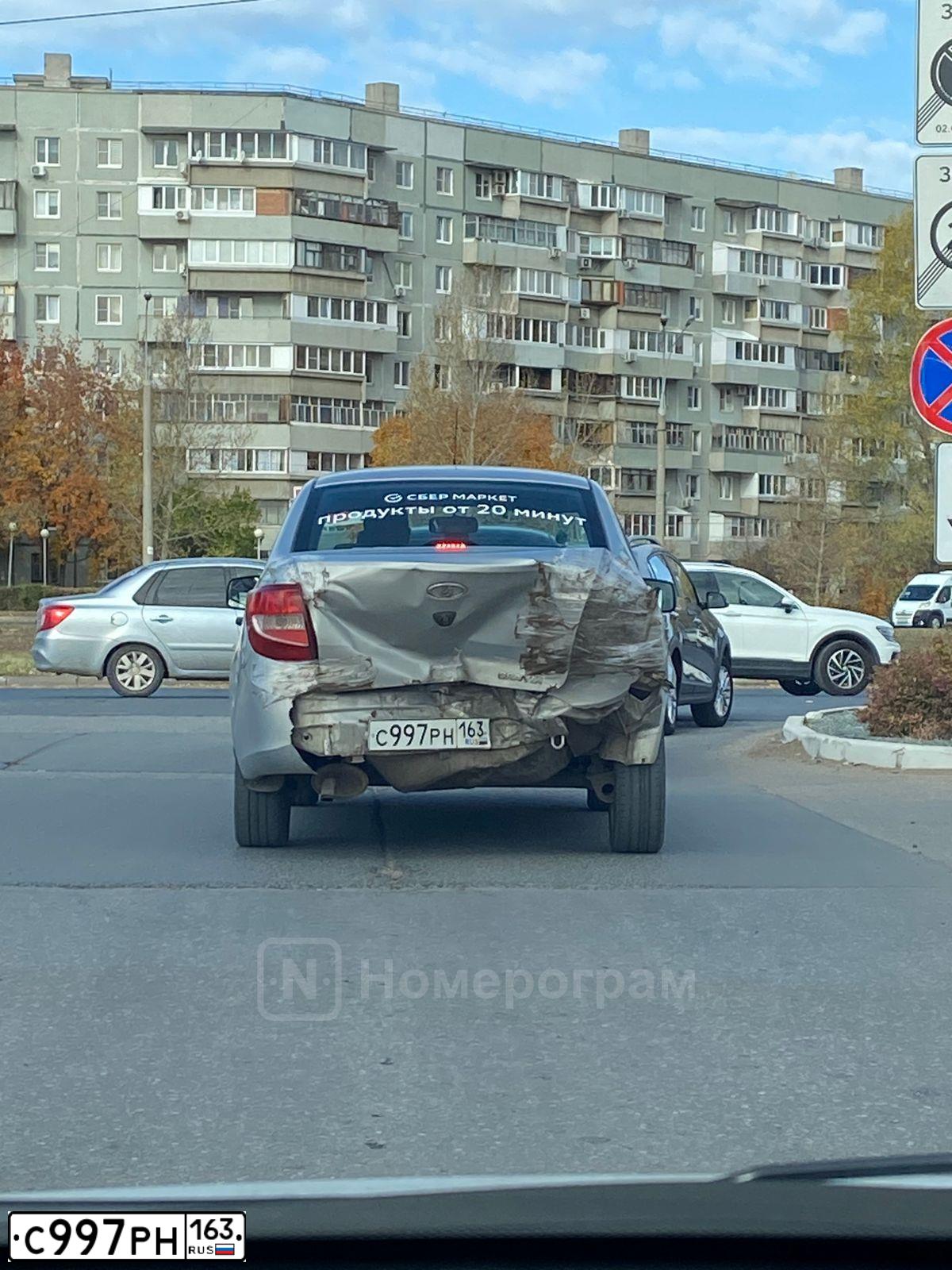 Фото автомобиля VAZ 2190 GRANTA, 2013 — госномер С997РН163. Цвет: Серебристый