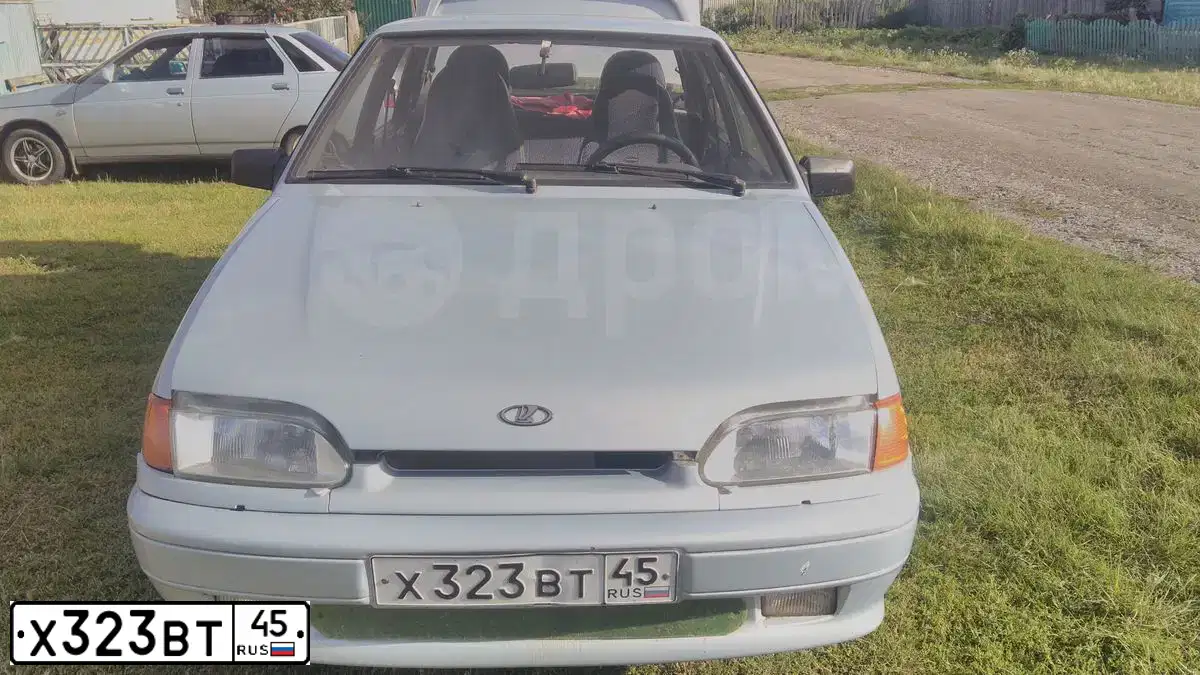 Фото автомобиля LADA 2115 SAMARA, 2005 — госномер Х323ВТ45. Цвет: Серебристо-Желтый